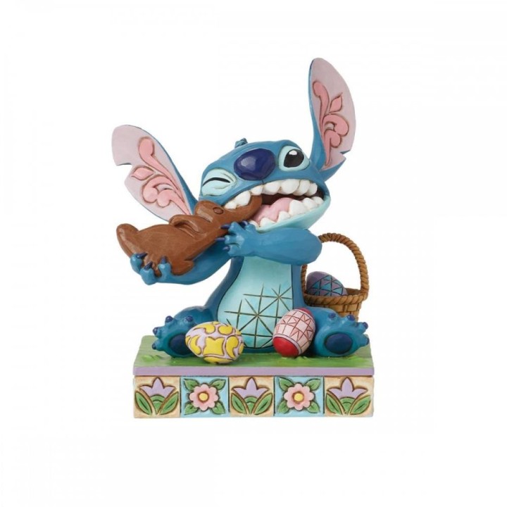 Figura enesco diseny stitch comiendo conejo